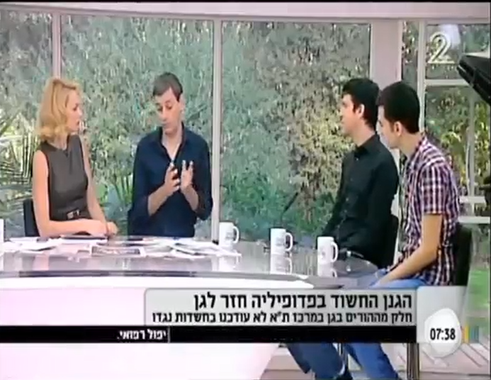 Avi Dubitzky being interviewed on TV