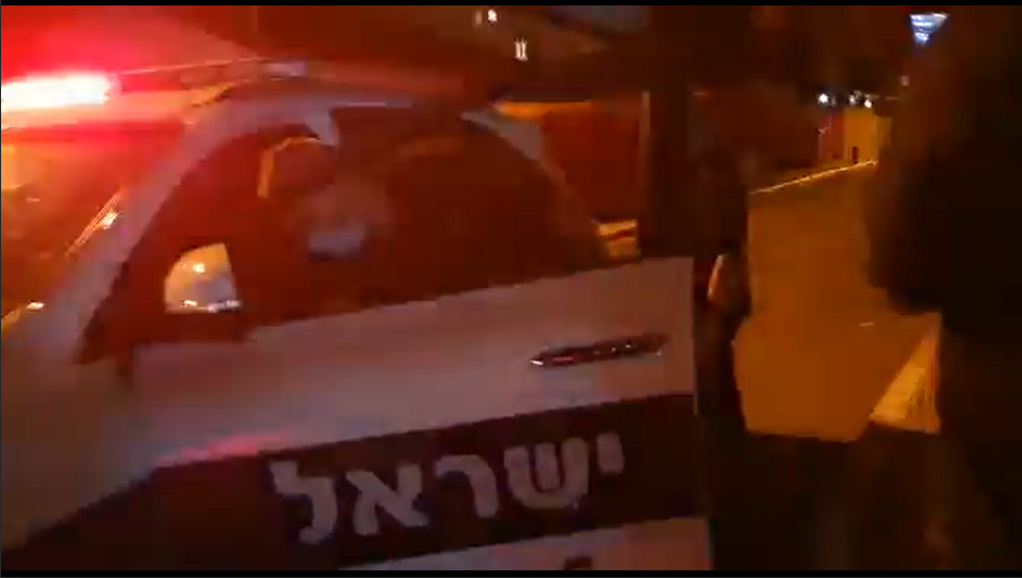 the suspect entering the police car